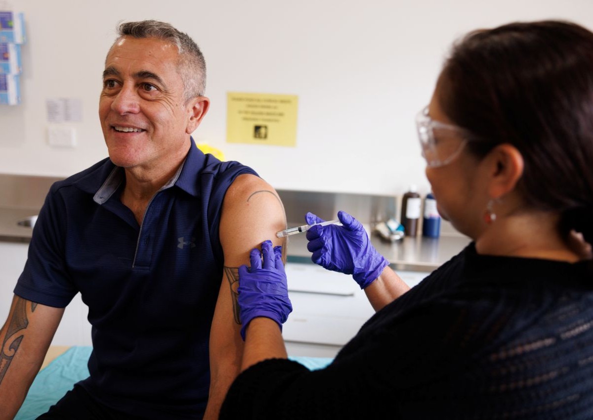 man receiving immunization